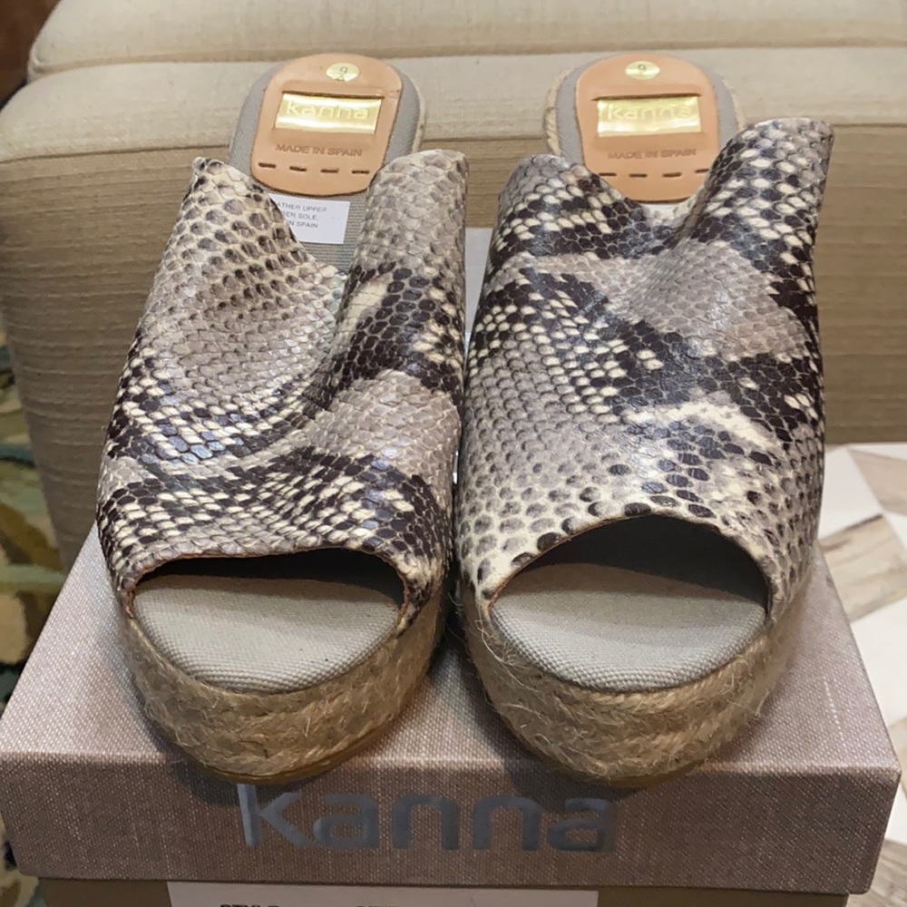 Leather-embossed snakeskin mule.
